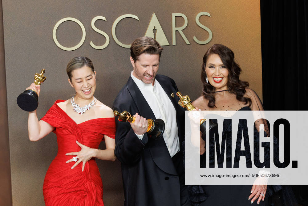 (L-R) Maggie Kang, Chris Appelhans, and Michelle L.M. Wong, winners of the Best Animated Feature Film Award for â€oeKPop Demon Huntersâ€Â, pose in the press room of the 98th Annual Academy Awards on Sunday March 15, 2026 at the Dolby Theater in Hollywood, California. PRENSA INTERNACIONAL Hollywood USA - ZUMAp124 20260315_zaa_p124_300