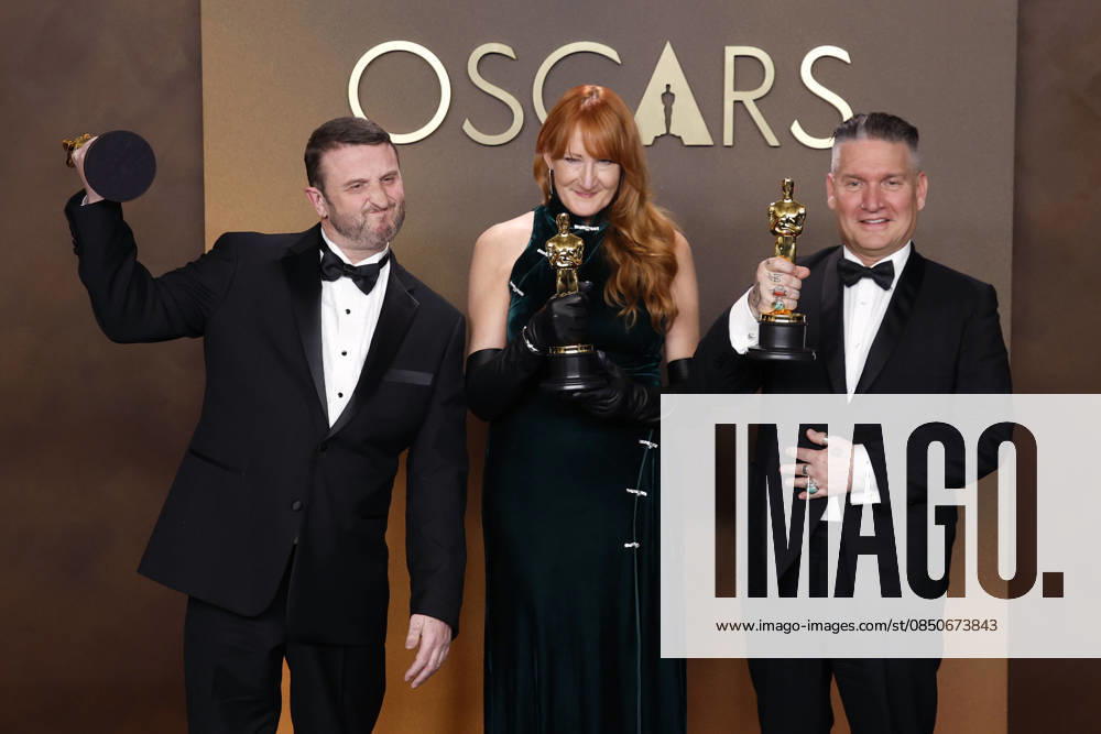 (L-R) Mike Hill, Cliona Furey, and Jordan Samuel in the press room of the 98th Annual Academy Awards on Sunday March 15, 2026 at the Dolby Theater in Hollywood, California. BURT HARRIS BNS PI Hollywood USA - ZUMAp124 20260315_zaa_p124_274