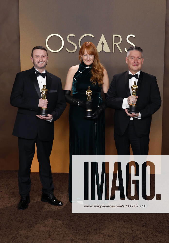 (L-R) Mike Hill, Cliona Furey, and Jordan Samuel in the press room of the 98th Annual Academy Awards on Sunday March 15, 2026 at the Dolby Theater in Hollywood, California. BURT HARRIS BNS PI Hollywood USA - ZUMAp124 20260315_zaa_p124_275