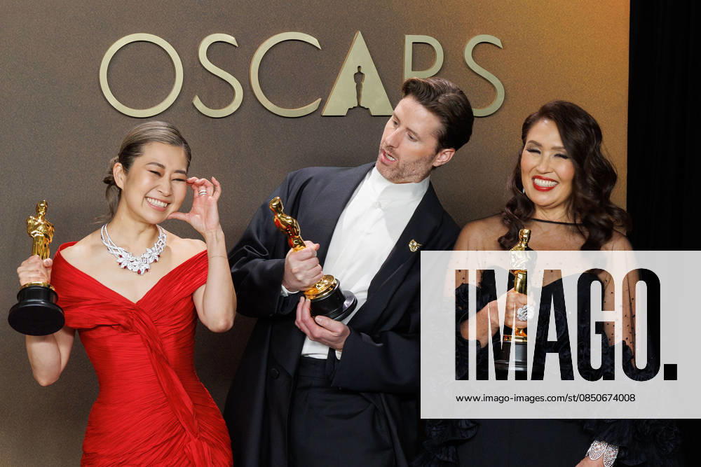 (L-R) Maggie Kang, Chris Appelhans, and Michelle L.M. Wong, winners of the Best Animated Feature Film Award for Ã¢â‚¬oeKPop Demon HuntersÃ¢â‚¬Â, pose in the press room of the 98th Annual Academy Awards on Sunday March 15, 2026 at the Dolby Theater in Hollywood, California. PRENSA INTERNACIONAL Hollywood USA - ZUMAp124 20260315_zaa_p124_304