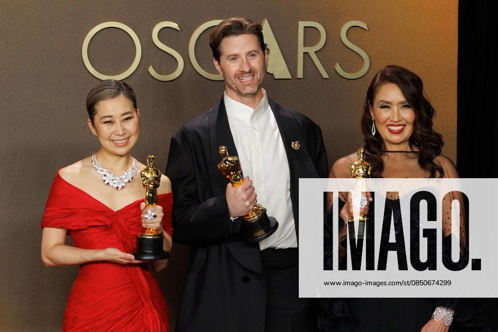 (L-R) Maggie Kang, Chris Appelhans, and Michelle L.M. Wong, winners of the Best Animated Feature Film Award for Ã¢â‚¬oeKPop Demon HuntersÃ¢â‚¬Â, pose in the press room of the 98th Annual Academy Awards on Sunday March 15, 2026 at the Dolby Theater in Hollywood, California. PRENSA INTERNACIONAL Hollywood USA - ZUMAp124 20260315_zaa_p124_328