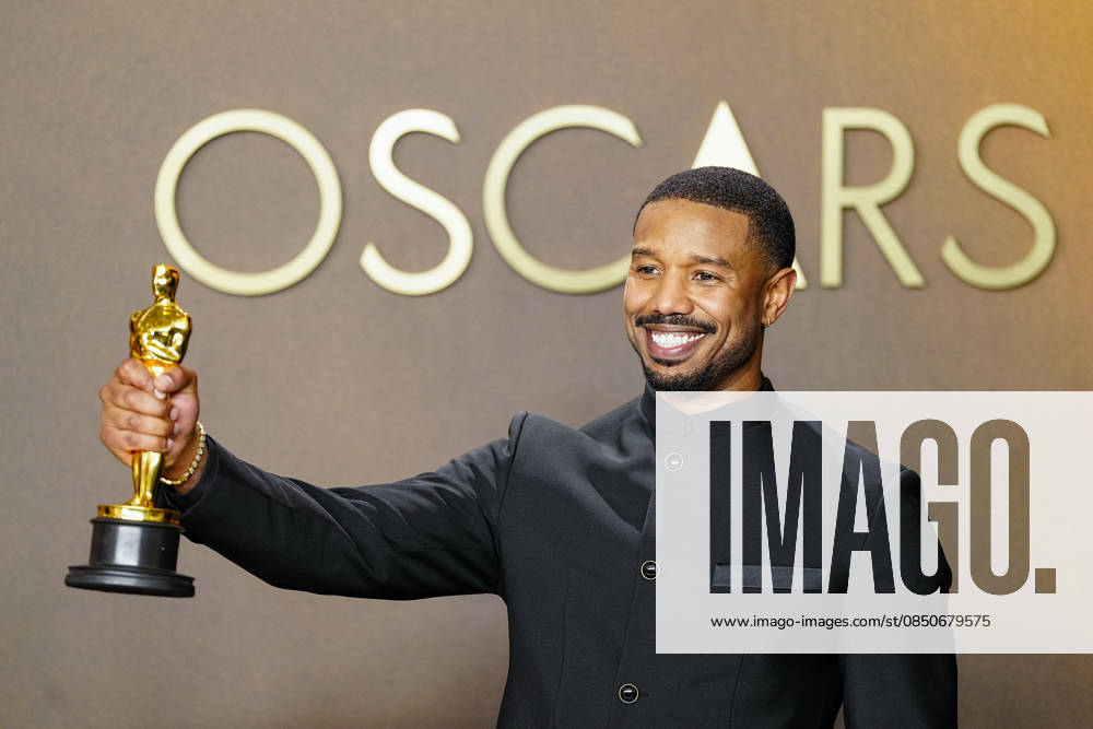 Michael B. Jordan celebrates in the press photo room after winning the Best Actor in a Leading Role Oscar for Sinners during the 98th annual Academy Awards in the Hollywood section of Los Angeles on Sunday, March 15, 2026. LAP202603152415 BONNIExCASH