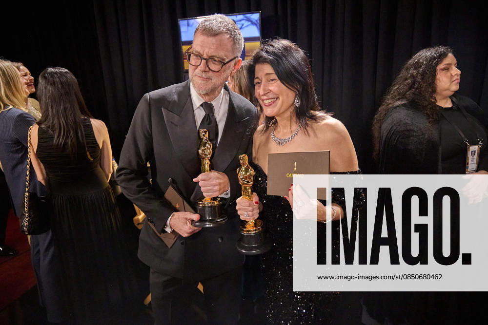 Paul Thomas Anderson and Cassandra Kulukundis pose backstage with the Oscar® for Adapted Screenplay and the Oscar® for Casting during the 98th Oscars® at Dolby® Theatre at Ovation Hollywood on Sunday, March 15, 2026. Los Angeles CA USA 350081199PLX