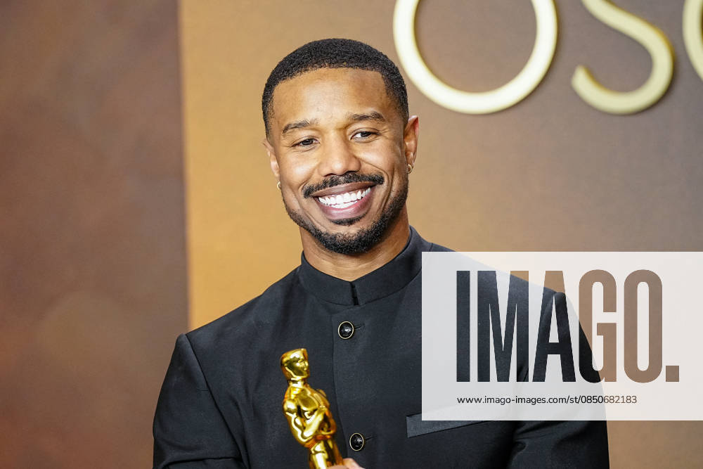 Michael B. Jordan celebrates in the press photo room after winning the Best Actor in a Leading Role Oscar for Sinners during the 98th annual Academy Awards in the Hollywood section of Los Angeles on Sunday, March 15, 2026. LAP2026031543346 BONNIExCASH