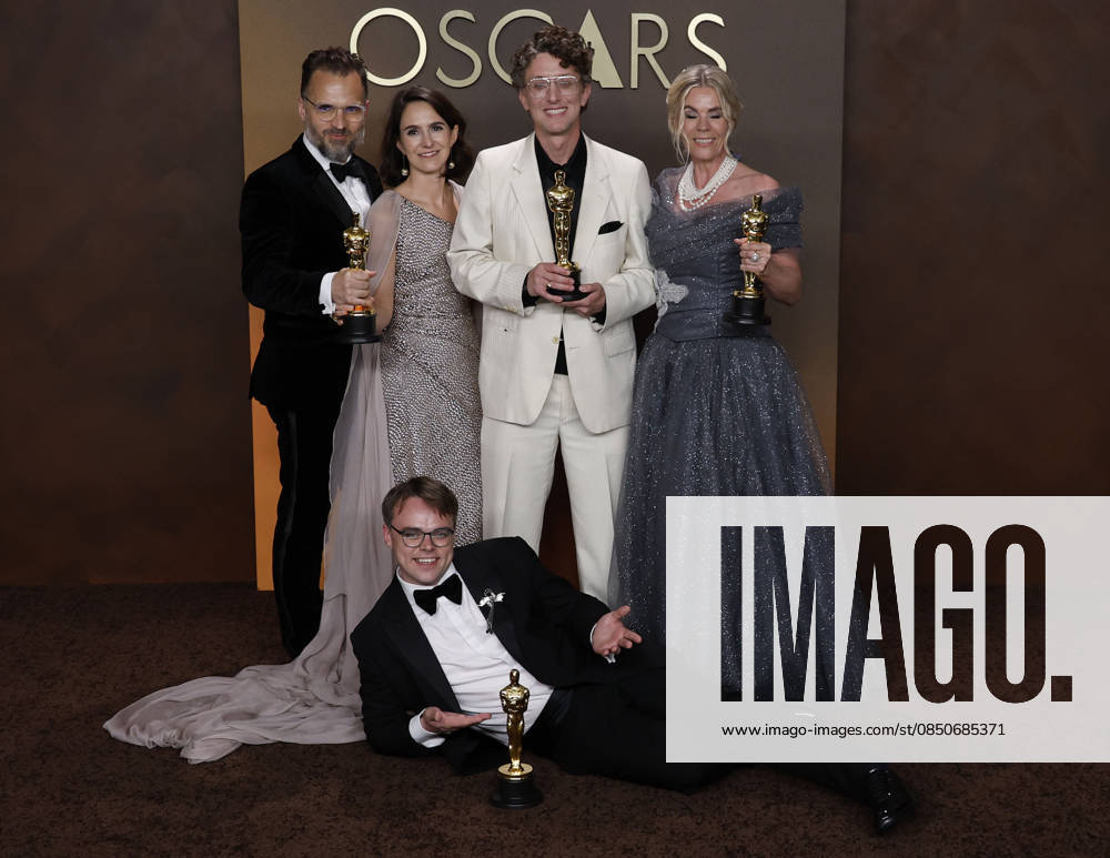 (L-R) Radovan Sibrt, AlA¾bĺta Karo¡skovo¡, David Borenstein, Pavel Talankin (laying on floor) in the press room of the 98th Annual Academy Awards on Sunday March 15, 2026 at the Dolby Theater in Hollywood, California. BURT HARRIS BNS PI Hollywood USA - ZUMAp124 20260315_zaa_p124_444