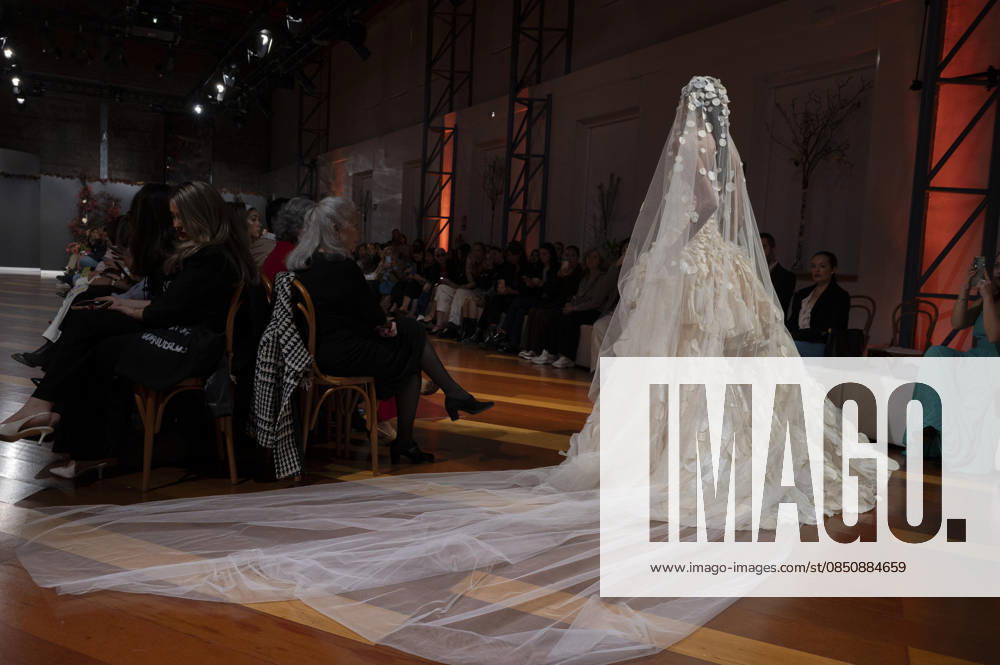 Telier Couture Fashion Week Madrid in Spain - 17 Mar 2026 A model walks the runway wearing a design by atelier couture during Fashion Week de Madrid in Fabric de Tapices. Madrid Spain