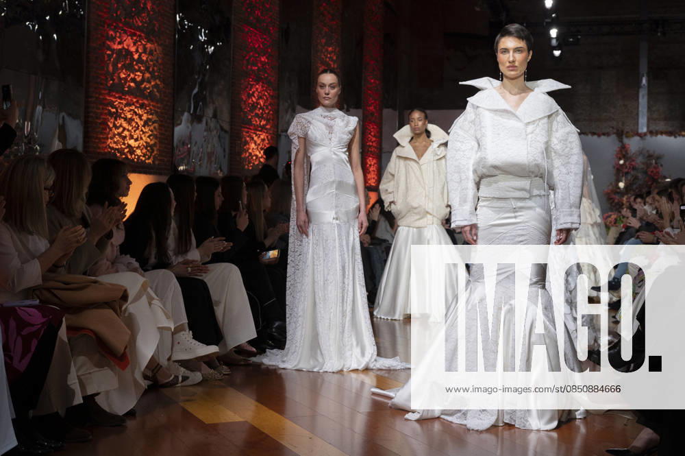 Telier Couture Fashion Week Madrid in Spain - 17 Mar 2026 A model walks the runway wearing a design by atelier couture during Fashion Week de Madrid in Fabric de Tapices. Madrid Spain