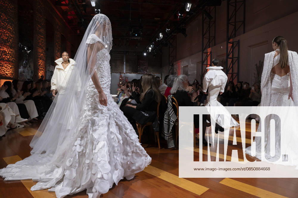 Telier Couture Fashion Week Madrid in Spain - 17 Mar 2026 A model walks the runway wearing a design by atelier couture during Fashion Week de Madrid in Fabric de Tapices. Madrid Spain