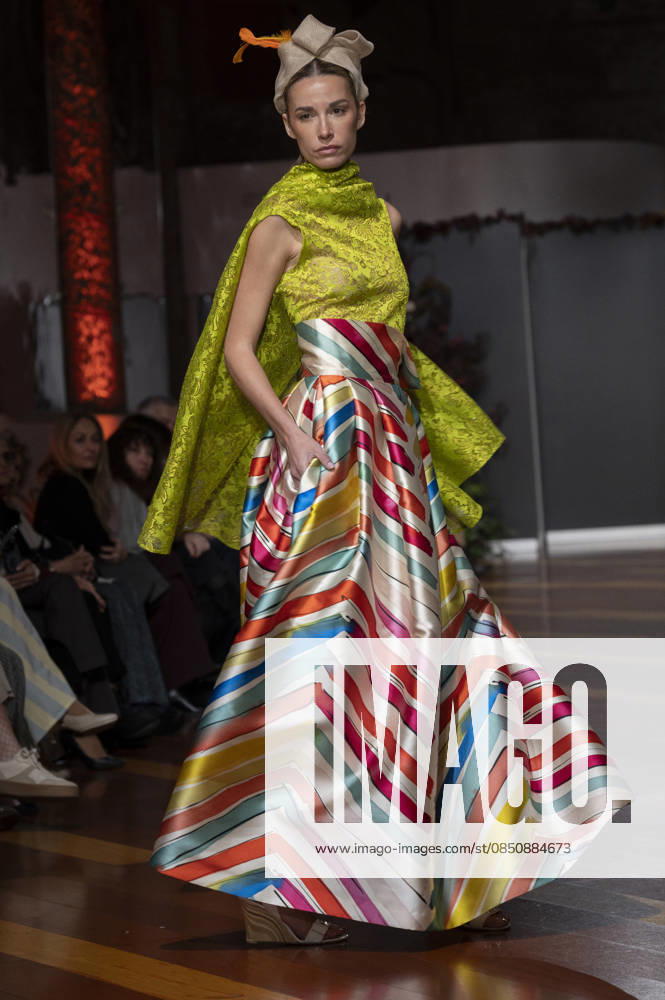 Telier Couture Fashion Week Madrid in Spain - 17 Mar 2026 A model walks the runway wearing a design by atelier couture during Fashion Week de Madrid in Fabric de Tapices. Madrid Spain