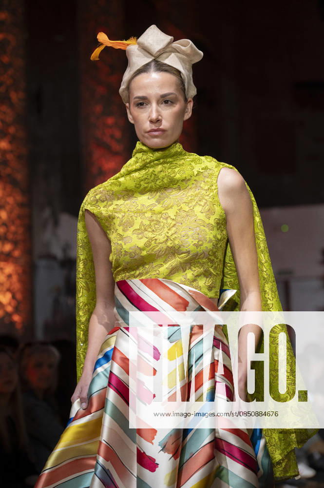 Telier Couture Fashion Week Madrid in Spain - 17 Mar 2026 A model walks the runway wearing a design by atelier couture during Fashion Week de Madrid in Fabric de Tapices. Madrid Spain