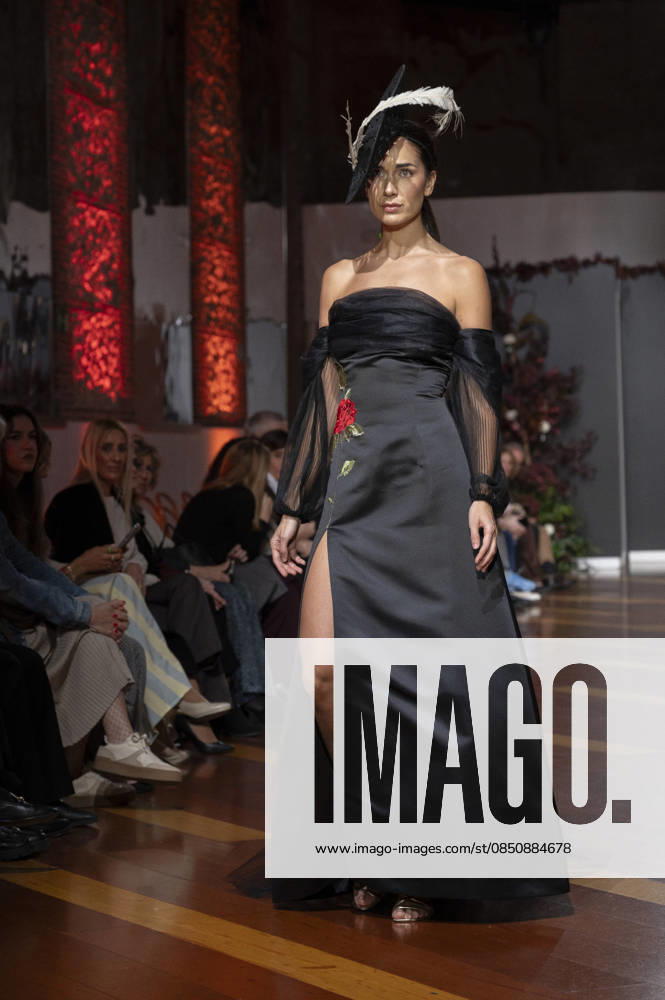 Telier Couture Fashion Week Madrid in Spain - 17 Mar 2026 A model walks the runway wearing a design by atelier couture during Fashion Week de Madrid in Fabric de Tapices. Madrid Spain