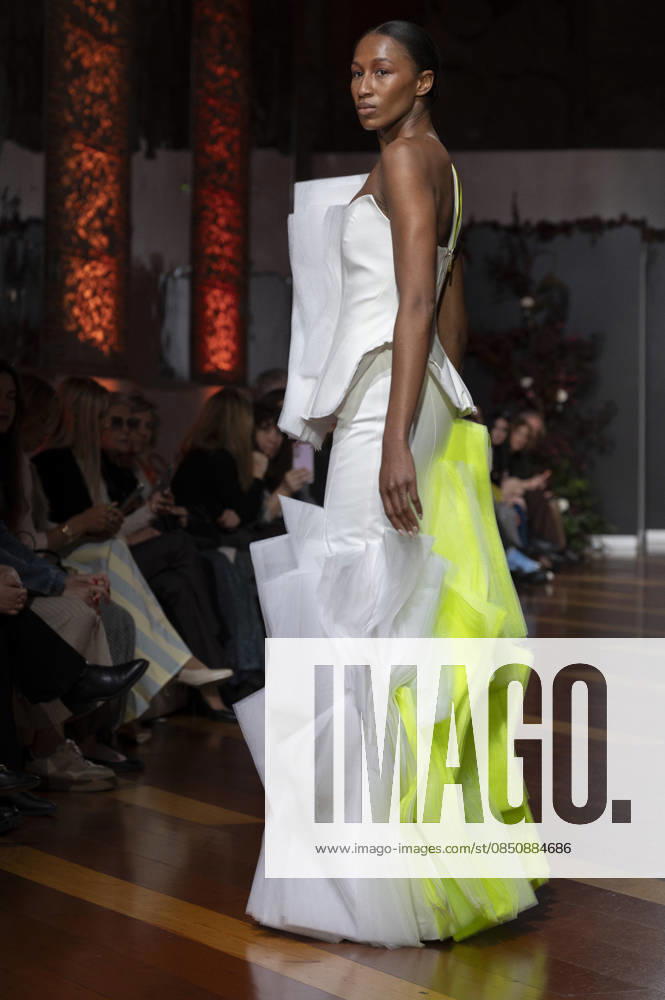 Telier Couture Fashion Week Madrid in Spain - 17 Mar 2026 A model walks the runway wearing a design by atelier couture during Fashion Week de Madrid in Fabric de Tapices. Madrid Spain