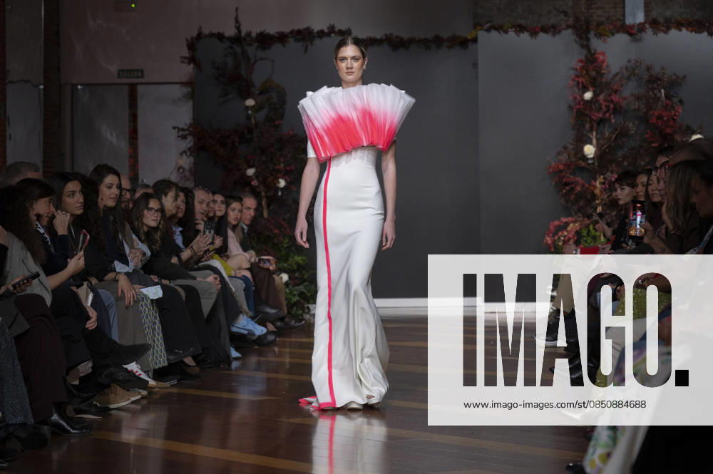 Telier Couture Fashion Week Madrid in Spain - 17 Mar 2026 A model walks the runway wearing a design by atelier couture during Fashion Week de Madrid in Fabric de Tapices. Madrid Spain