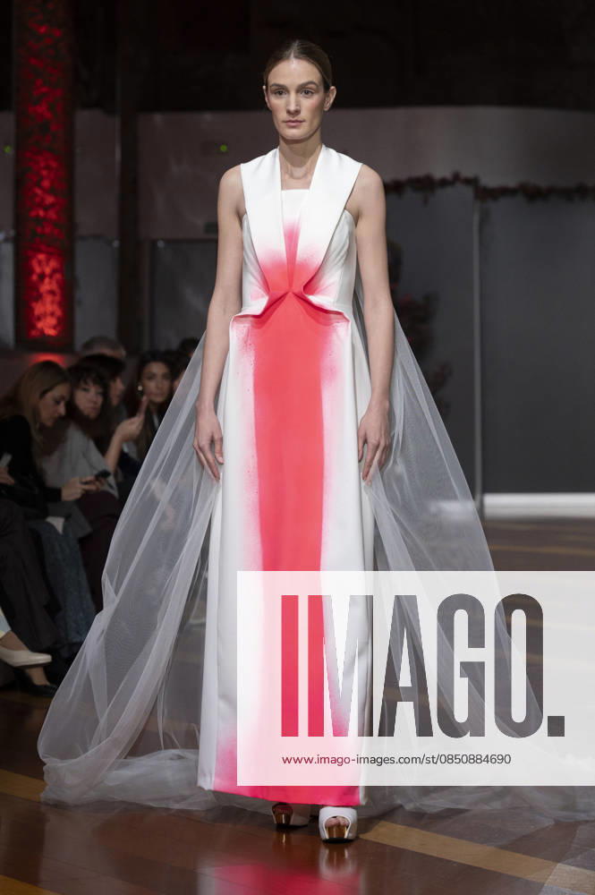 Telier Couture Fashion Week Madrid in Spain - 17 Mar 2026 A model walks the runway wearing a design by atelier couture during Fashion Week de Madrid in Fabric de Tapices. Madrid Spain