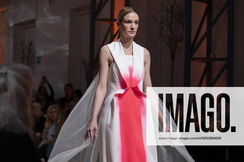 Telier Couture Fashion Week Madrid in Spain - 17 Mar 2026 A model walks the runway wearing a design by atelier couture during Fashion Week de Madrid in Fabric de Tapices. Madrid Spain