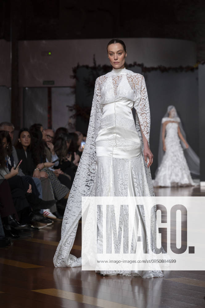 Telier Couture Fashion Week Madrid in Spain - 17 Mar 2026 A model walks the runway wearing a design by atelier couture during Fashion Week de Madrid in Fabric de Tapices. Madrid Spain