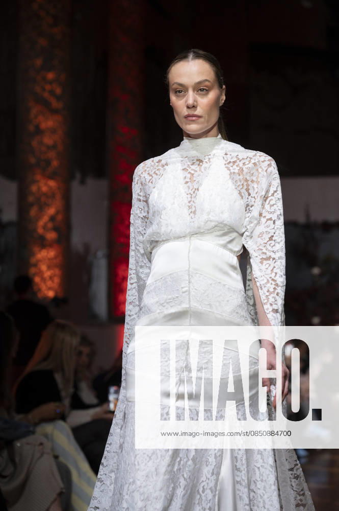 Telier Couture Fashion Week Madrid in Spain - 17 Mar 2026 A model walks the runway wearing a design by atelier couture during Fashion Week de Madrid in Fabric de Tapices. Madrid Spain
