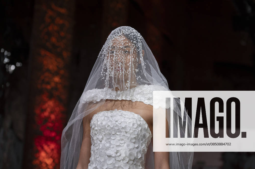 Telier Couture Fashion Week Madrid in Spain - 17 Mar 2026 A model walks the runway wearing a design by atelier couture during Fashion Week de Madrid in Fabric de Tapices. Madrid Spain