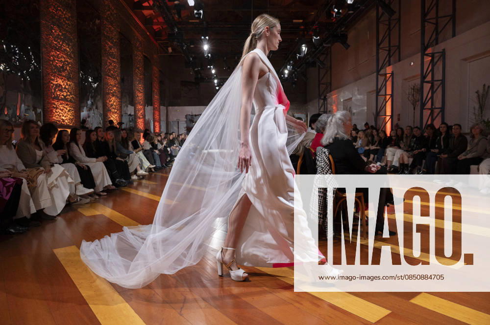 Telier Couture Fashion Week Madrid in Spain - 17 Mar 2026 A model walks the runway wearing a design by atelier couture during Fashion Week de Madrid in Fabric de Tapices. Madrid Spain