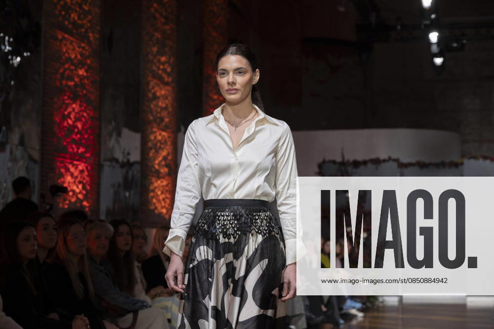 Telier Couture Fashion Week Madrid in Spain - 17 Mar 2026 A model walks the runway wearing a design by atelier couture during Fashion Week de Madrid in Fabric de Tapices. Madrid Spain