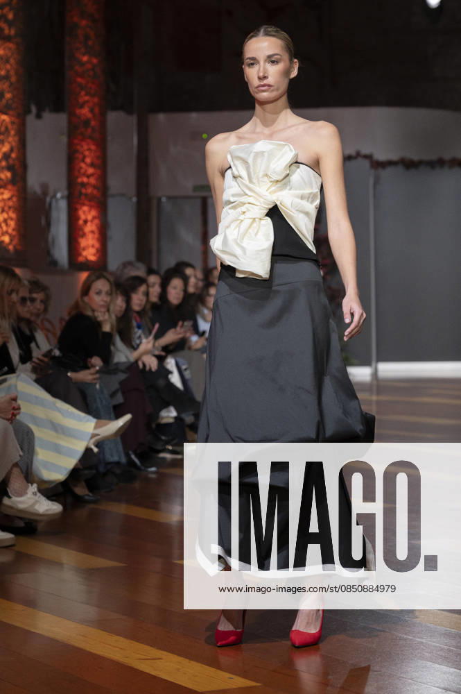 Telier Couture Fashion Week Madrid in Spain - 17 Mar 2026 A model walks the runway wearing a design by atelier couture during Fashion Week de Madrid in Fabric de Tapices. Madrid Spain