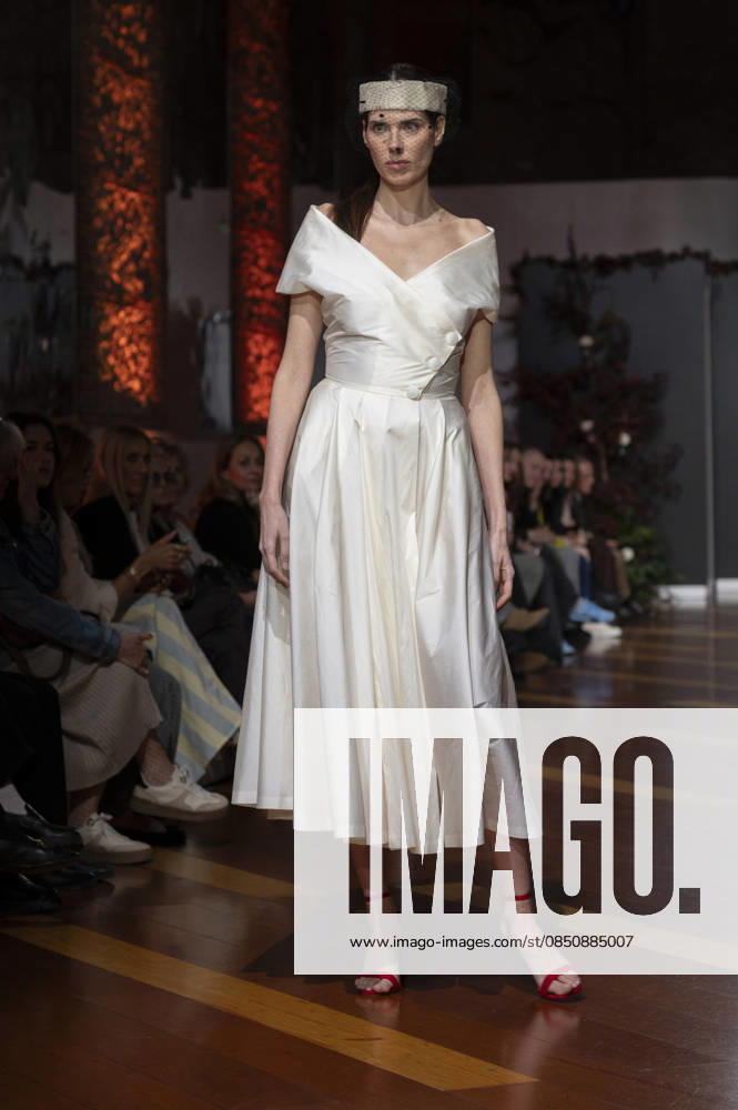 Telier Couture Fashion Week Madrid in Spain - 17 Mar 2026 A model walks the runway wearing a design by atelier couture during Fashion Week de Madrid in Fabric de Tapices. Madrid Spain