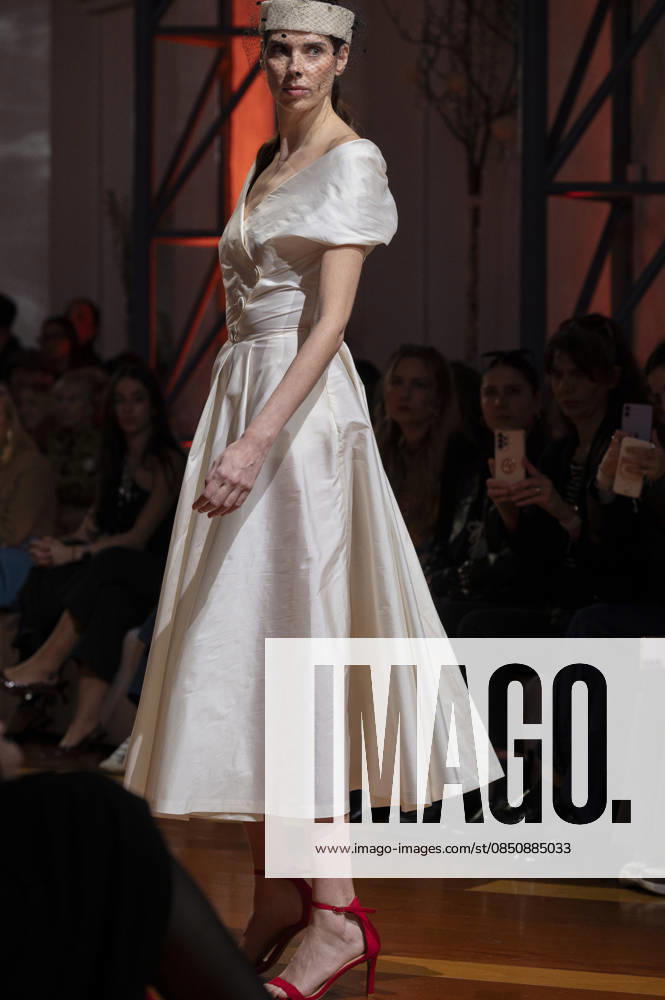 Telier Couture Fashion Week Madrid in Spain - 17 Mar 2026 A model walks the runway wearing a design by atelier couture during Fashion Week de Madrid in Fabric de Tapices. Madrid Spain