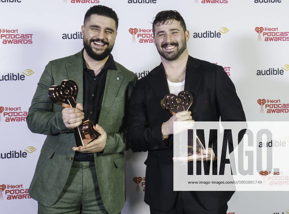 Austin, Texas. 2026 IHeartPodcast Awards, winners pose with their awards. Joe Santagato & Frankie Alvarez - for Best Comedy & Best Ensemble, - The Basement Yard. - ZUMAda1_ 20260316_zap_da1_066