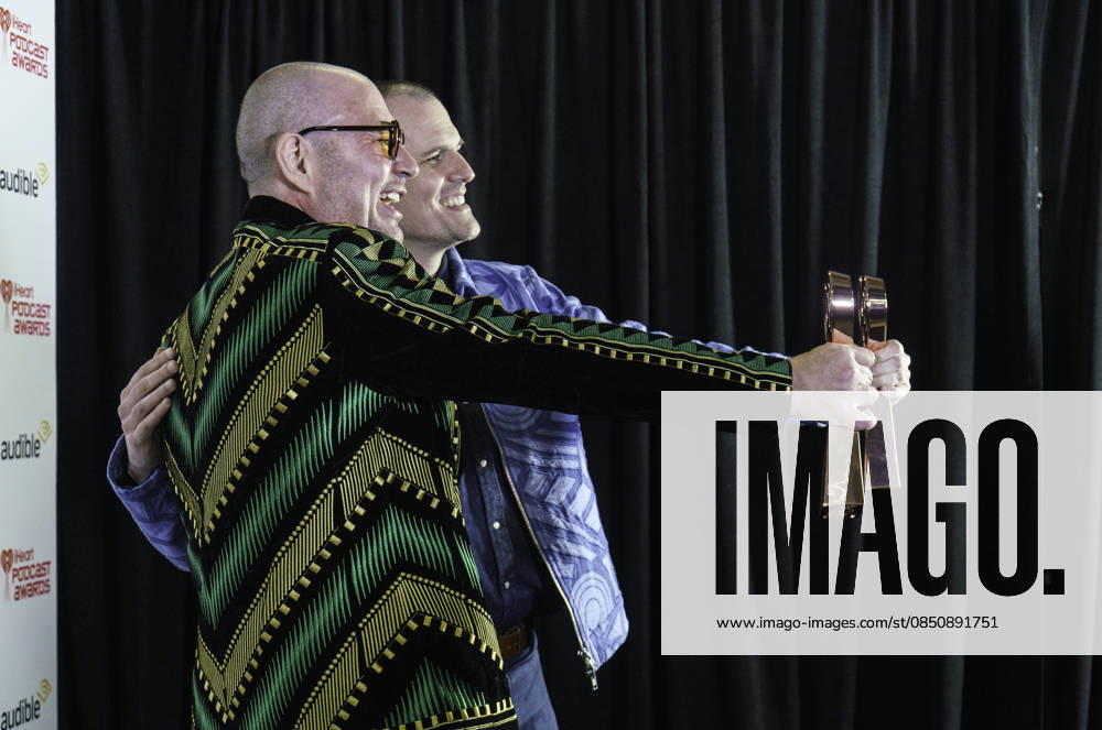 Austin, Texas. 2026 IHeartPodcast Awards, winners pose with their awards. Ben Mandelker & Ronnie Karam - Watch What Crappens Best TV & Film. - ZUMAda1_ 20260316_zap_da1_071
