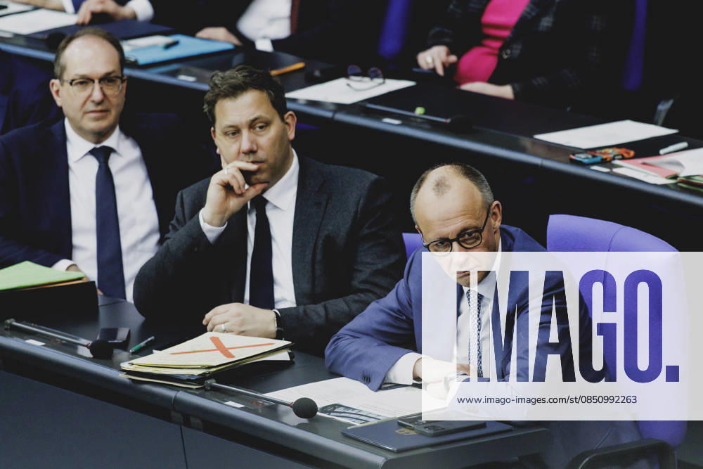 R L Friedrich Merz CDU , Federal Chancellor, Lars Klingbeil, Federal Minister of Finance, and Alexander Dobrindt CSU , Federal Minister of the Interior, recorded during the debate on the government declaration in the German Bundestag in Berlin, 18 03 2026 Berlin Germany