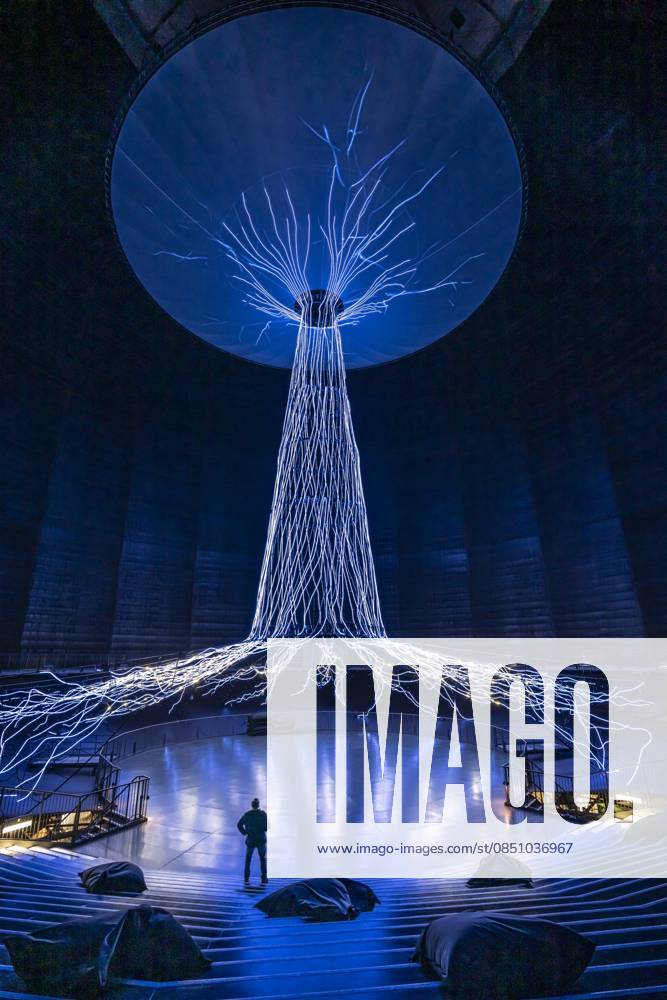 New exhibition in the Gasometer Oberhausen, art sculpture The Tree, 40 meter high light installation, shows with light and music different stages of a tree, exhibition Mythos Wald, on 3 levels and with several thematic chapters the exhibition shows the diversity of the worlds forests with pictures, videos and exhibits, NRW, Germany, Mythos Wald Oberhausen