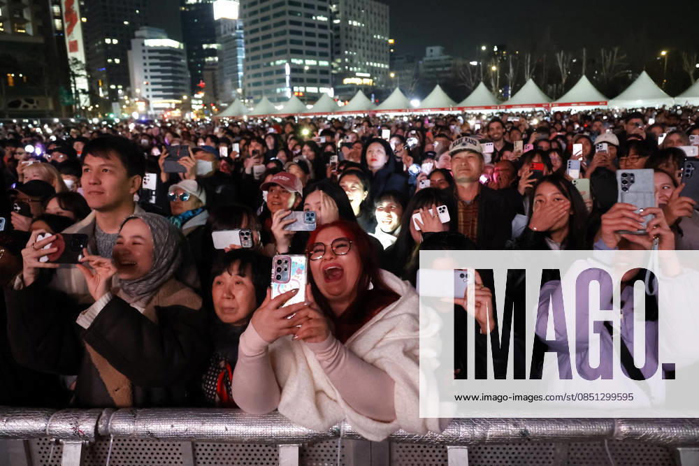 BTS Performs ARIRANG Comeback Concert at Gwanghwamun Square Fans cheer on South Korean K-pop group BTS performing BTS THE COMEBACK LIVE: ARIRANG, a free comeback concert celebrating the release of their fifth studio album, at Gwanghwamun Square in Seoul, South Korea on March 21, 2026. The concert marks the group s first full-unit comeback in four years following the completion of mandatory military service for all members. Seoul South Korea