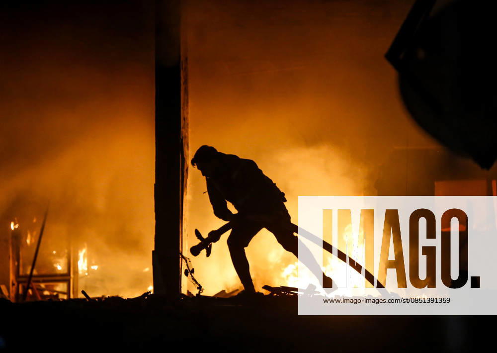 Israeli military carried out an airstrike on Gaza GAZA CITY, GAZA - MARCH 22: Civil defense teams fight the fire that broke out in the building following the Israeli attack in Gaza City, Gaza on March 22, 2026. Saeed M. M. T. Jaras Anadolu Gaza City Gaza. Editorial use only. Please get in touch for any other usage.