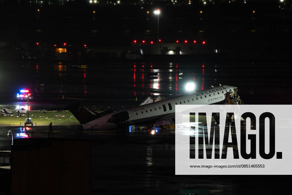 Air Canada plane collides with fire truck at LaGuardia, killing 2, injuring others NEW YORK, UNITED STATES - MARCH 23: Passenger plane collides with a fire truck while landing at LaGuardia Airport, killing the pilot and copilot and injuring two others on March 23, 2026, in New York, United States. Lokman Vural Elibol Anadolu New York United States. Editorial use only. Please get in touch for any other usage.