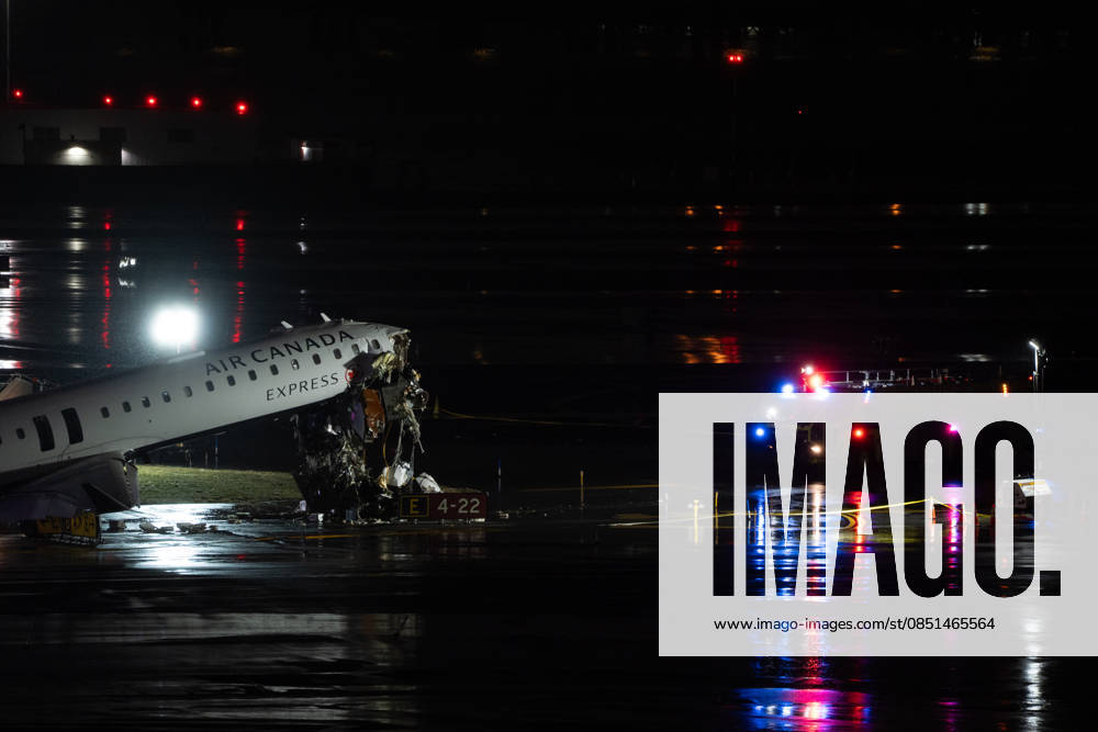 Air Canada plane collides with fire truck at LaGuardia, killing 2, injuring others NEW YORK, UNITED STATES - MARCH 23: Passenger plane collides with a fire truck while landing at LaGuardia Airport, killing the pilot and copilot and injuring two others on March 23, 2026, in New York, United States. Lokman Vural Elibol Anadolu New York United States. Editorial use only. Please get in touch for any other usage.