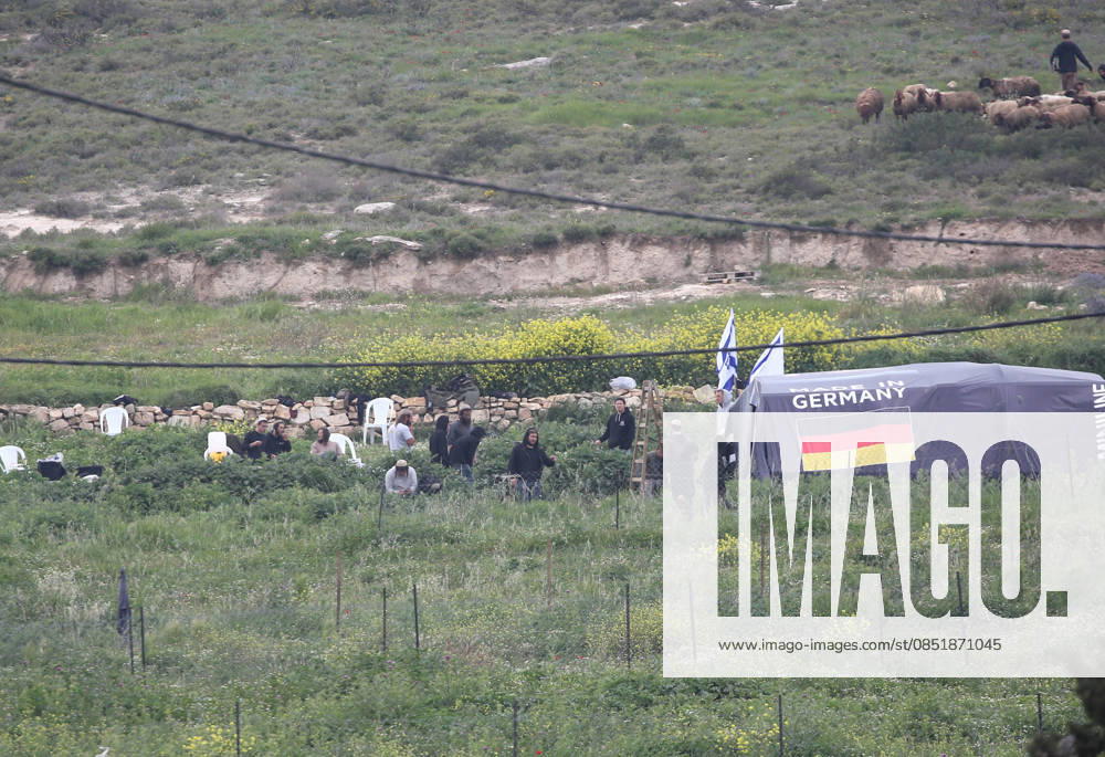 A Jewish settler herds sheep while settlers establish a pastoral outpost at the site where Jewish settler Yehuda Shmuel Sherman was killed in Palestinian agricultural fields in the village of Beit Ummar, north of Nablus in the West Bank. Nablus Palestine - ZUMAs197 20260326_aaa_s197_057