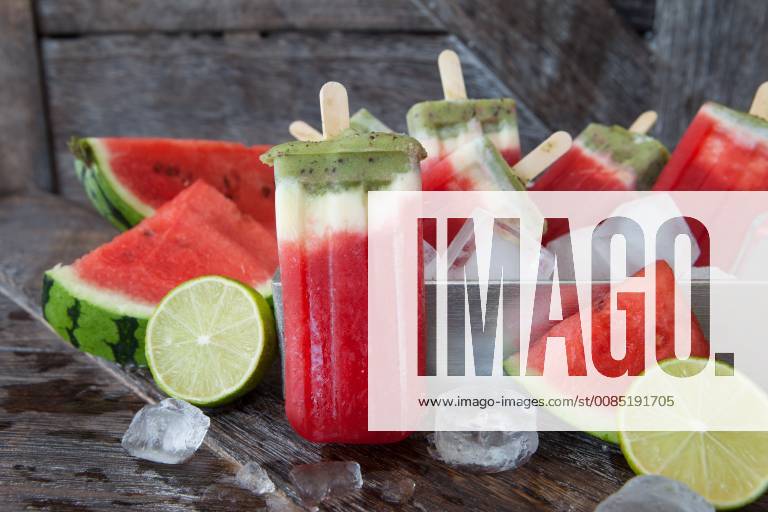 Popsicles with yogurt and fresh fruits Homemade frozen popsicles 1079705165