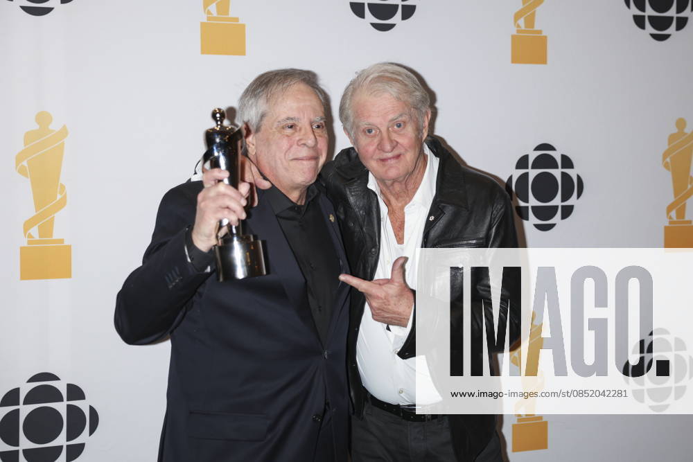 Vinny Cinquemani, left, recipient of the Walt Grealis Special Achievement Award, poses for a photo with Tom Cochrane during the 2026 Juno Awards Gala in Hamilton, Saturday, March 28, 2026. Hamilton Canada - ZUMAc35_ 20260328_zaf_c35_185