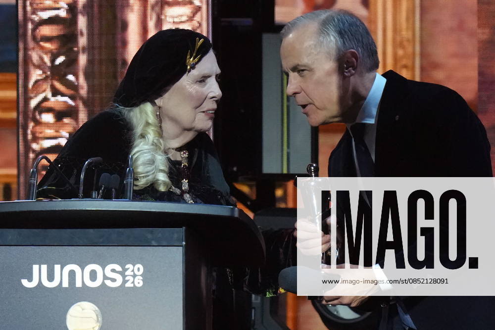 Prime Minister Mark Carney presents the Lifetime Achievement award to Joni Mitchell at the 2026 Juno Awards in Hamilton, on Sunday, March 29, 2026. Hamilton CANADA - ZUMAc35_ 20260329_zaf_c35_261