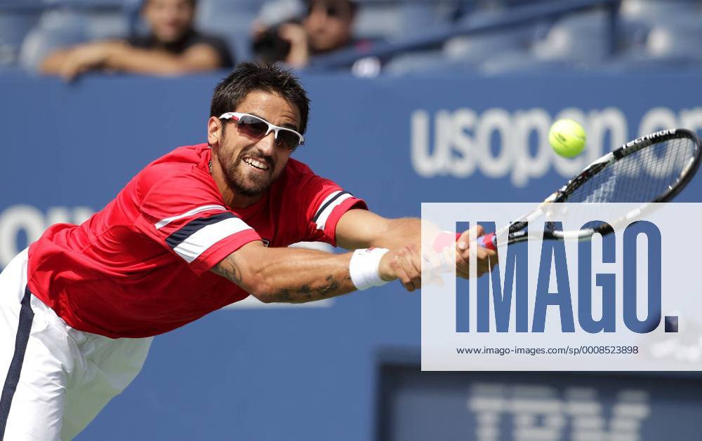 Janko Tipsarevic of Serbia reaches to return a serve on day 8 in Louis Armstrong Stadium at the U.S. Open Tennis Championships at the Billie Jean King National Tennis Center in New York City on September 5, 2011. NYP20110905110