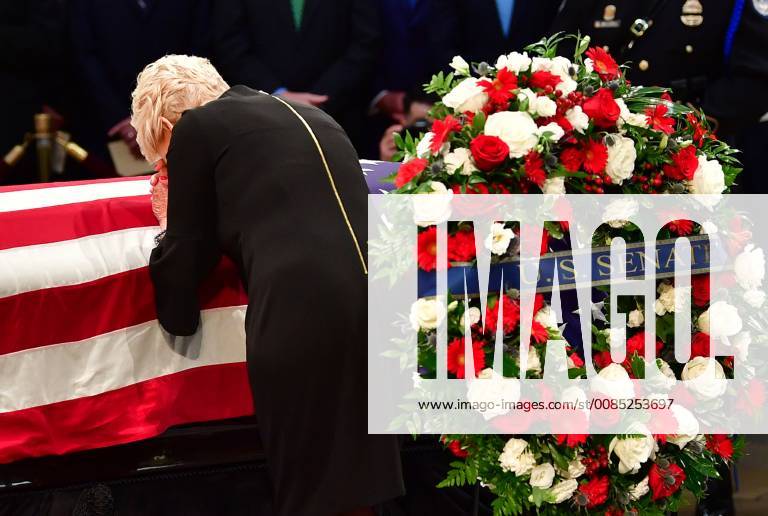 U.S. - Cindy McCain leans over the casket of former Senator John McCain in the Capitol Rotunda where he will lie in state at the U.S. Capitol, in Washington, DC on Friday, August 31, 2018. McCain, an Arizona Republican, presidential candidate and war hero died August 25th at the age of 81. He is the 31st person to lie in state at the Capitol in 166 years. UPI U.S. - ZUMAs152 20180831_zaa_s152_148