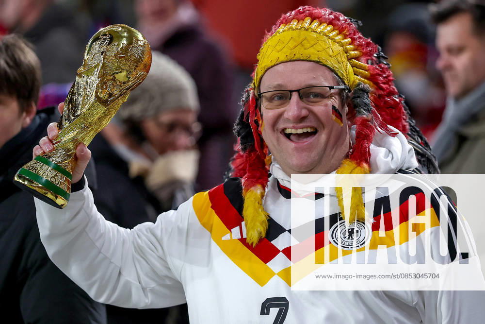 Football, International match, Germany Ghana, MHP Arena Stuttgart , Season 2025 2026 A fans Germany fan German soccer fan with trophy Trophy Fifa World Cup and sign lettering Banner Road to Final disguised Feature Atmosphere Indian Chief DFB regulations prohibit any use of photographs as image sequences and or quasi video Baden Württemberg G