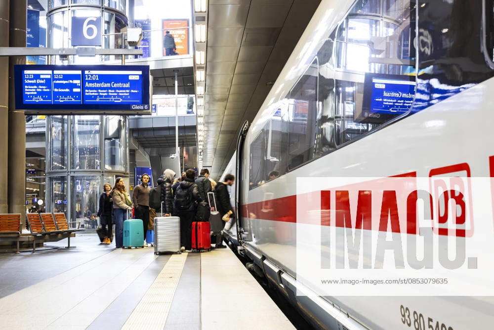 Berlin Central Station ICE at platform with passengers ICE144 to Amsterdam CS 24 03 2026, Berlin, Germany