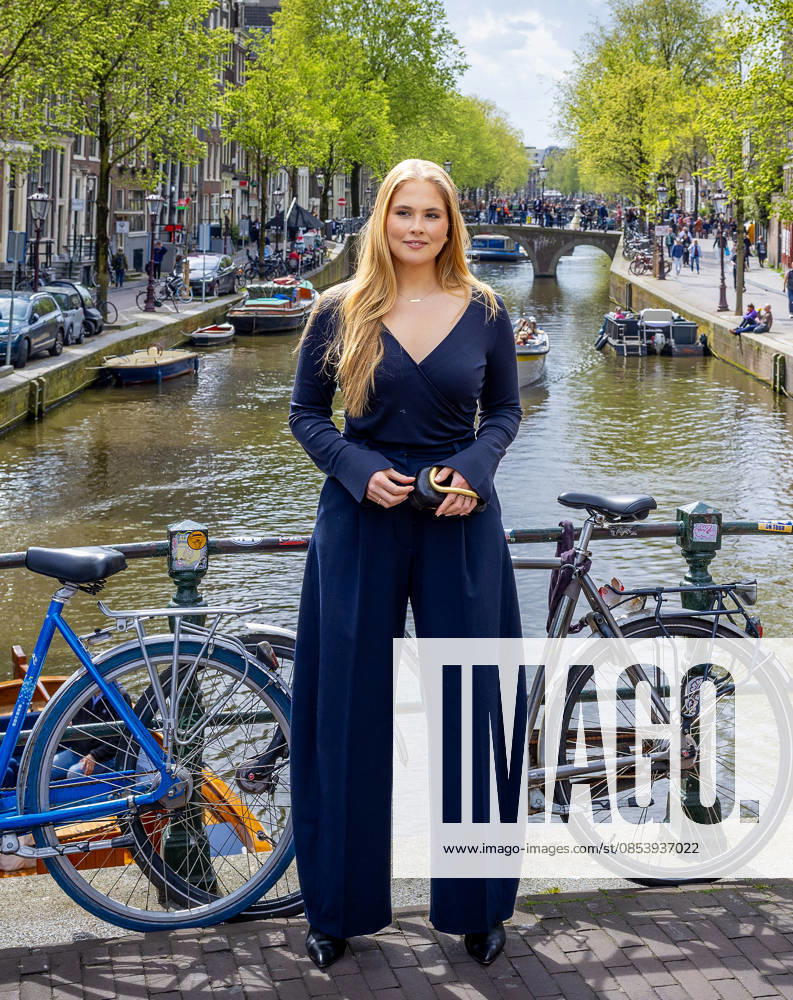 Amsterdam Princess Amalia posing for the media on the Oudezijds Voorburgwal, on the bridge between the Lange Niezel and the Korte Niezel, on her 2nd day of the 2 day visit to Amsterdam. Â
