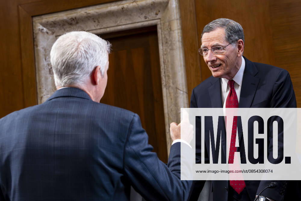 Sen. John Barrasso, R-WY, speaks with Secretary of Energy Chris Wright before a Senate Energy and Natural Resources Committee hearing on the Department of Energy s budget request for fiscal year 2027 in the Dirksen Senate Office Building near the U.S. Capitol in Washington, DC on Tuesday, April 21, 2026. Wright has warned that gas prices may not drop below $3 until next year, which the Trump Administration claims is totally wrong. WAP20260421300 BONNIExCASH