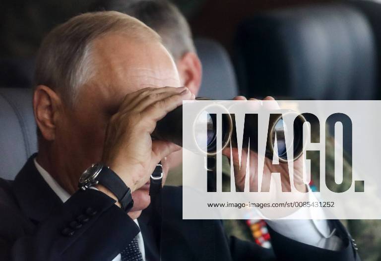Russia s President Vladimir Putin observes the main stage of the Vostok 2018 military excercises held jointly by the Russian Armed Forces and the Chinese People s Liberation Army at the Tsugol range. Vyacheslav Prokofyev TASS TS09056E
