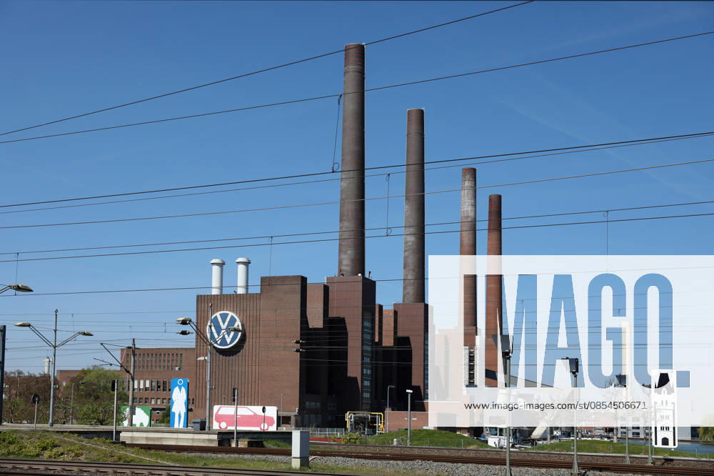 VW Wolfsburg, 23 04 2026, VW sign on the cogeneration plant Wolfsburg North South VW power plant, four chimneys, at Wolfsburg main station Lower Saxony Germany