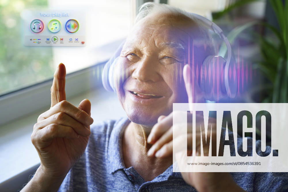Smiling active senior listening to music with hologram indoors model released, Symbolfoto property released, AZF01256
