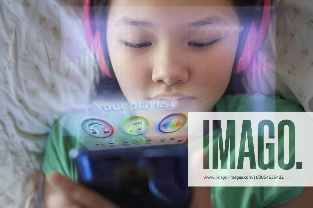 User listening to music via holographic app model released, Symbolfoto property released, AZF01257