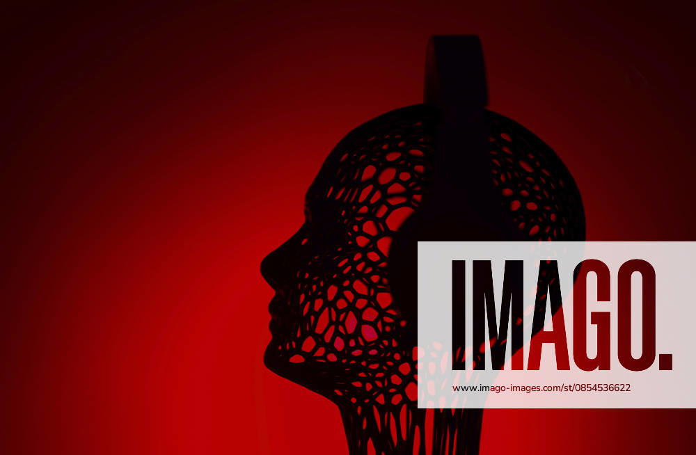 Wireframe artificial intelligence head listening to music on red, AZF01263